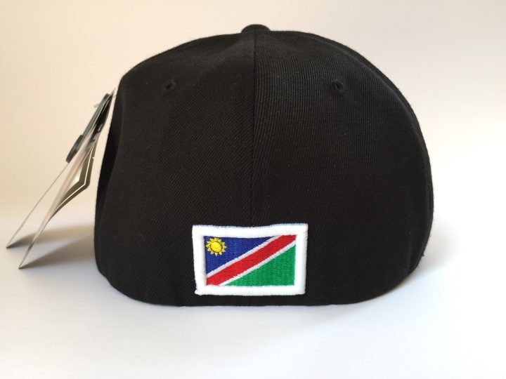 FFF01133 – Black Flat Peak Flexfit by !Na Caps in Namibia